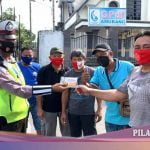 Satuan Lalulintas Polres Minsel Bagi-Bagi Masker dan Vitamin