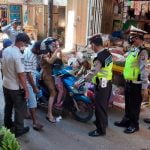 Gugus Tugas Covid-19 di Kotamobagu Ingatkan Pengunjung Pasar Patuhi Protokol Kesehatan