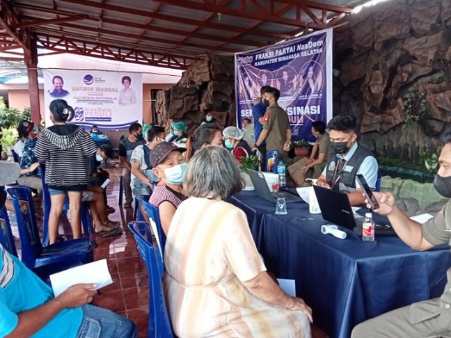 Partai Nasdem Minsel Gelar Vaksinasi Massal di Wilayah Tumpaan