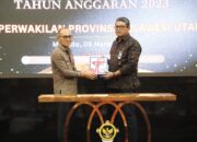 Pj Bupati Ronald Sorongan Serahkan Laporan Keuangan Pemkab Mitra ke BPK RI Provinsi Sulut
