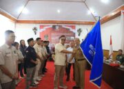 Pj Walikota Kotamobagu dan ketua DPRD Kotamobagu Hadiri Pelantikan Pengurus PWI