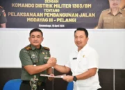 TNI dan Pemda Boltim Teken PKS untuk Pembangunan Jalan Perkebunan