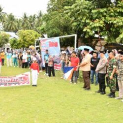 Pemkab Boltim Semarakkan HUT RI ke-80 Lewat Lomba Gerak Jalan Meriah