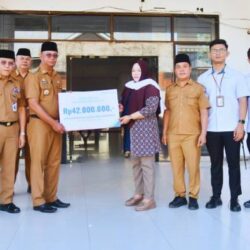 Bupati Oskar Manoppo Serahkan Santunan Duka BPJS, Tegaskan Perlindungan Pekerja Boltim