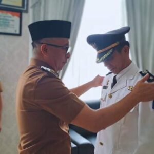Wabup Argo Sumaiku Lantik Ikhlas Pasambuna sebagai Pj Sangadi Kotabunan