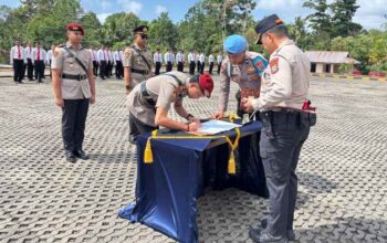 Polres Mitra menggelar sertijab Kasat Reskrim dan Kapolsek Ratatotok. AKBP Handoko minta peningkatan kinerja dan sinergi.