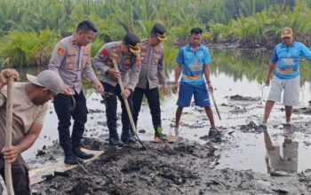 Kapolres Boltim Pimpin Green Policing di Hutan Bakau Tutuyan, Ajak Nelayan Jaga Kelestarian Alam